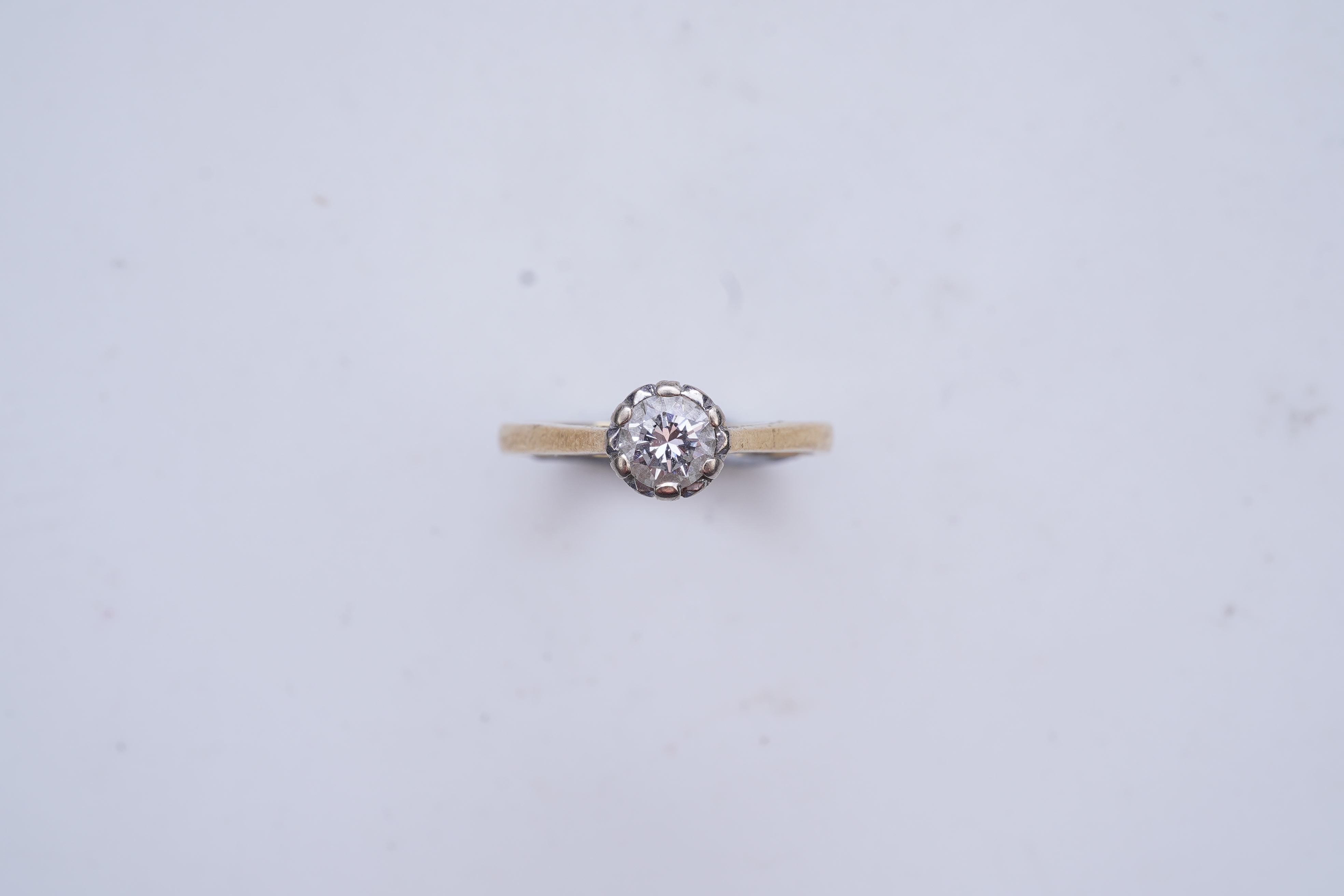 A diamond solitaire ring